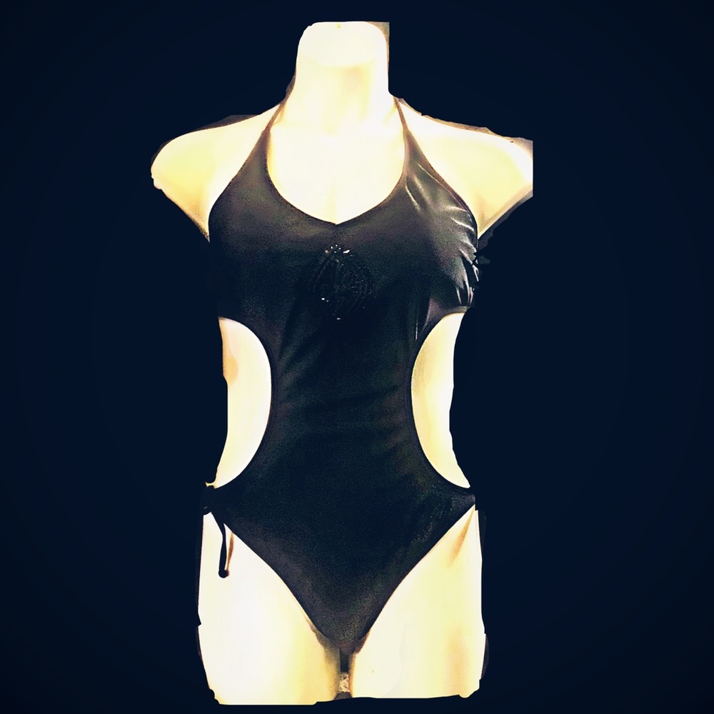 Juniors black 1-piece Monokini swimsuit Black monokini. Never been worn. Size XL